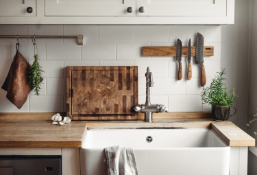 Compare Wooden kitchenware and plastic and metal utensils